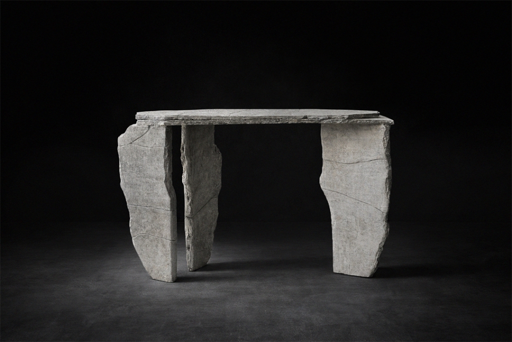 Sculptural stone table by Isac Elam Kaid composed of fractured hand-carved stone elements