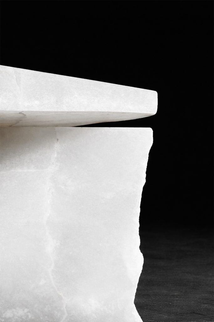 Monolithic marble console table with fractured stone supports by sculptor Isac Elam Kaid