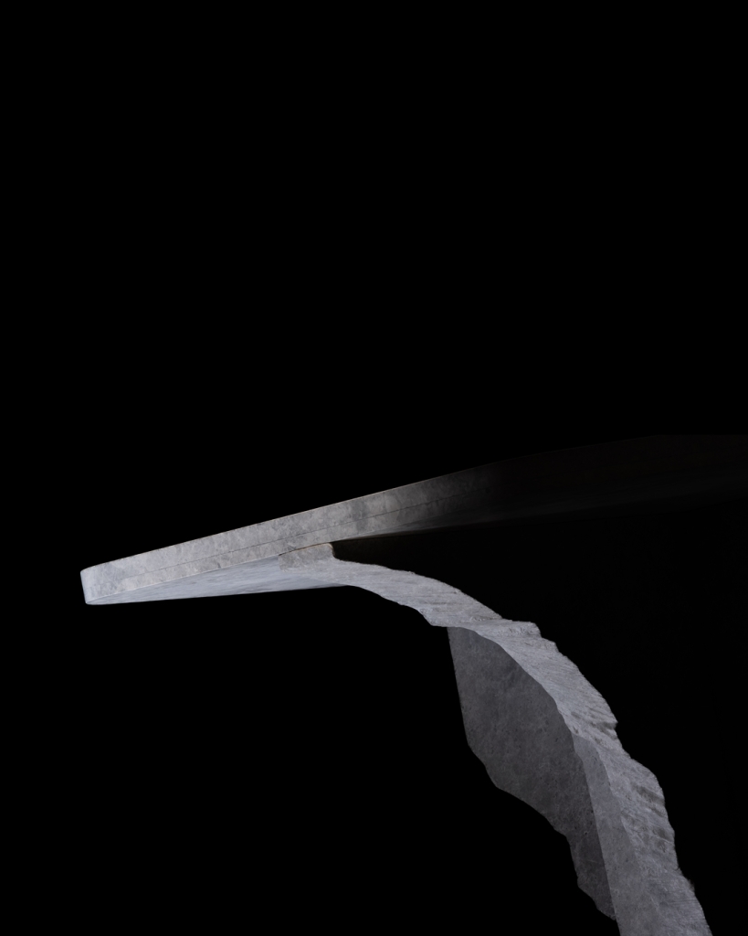 Detail of fractured Grey Tundra marble surface on sculptural stone table K2319 by Isac Elam Kaid