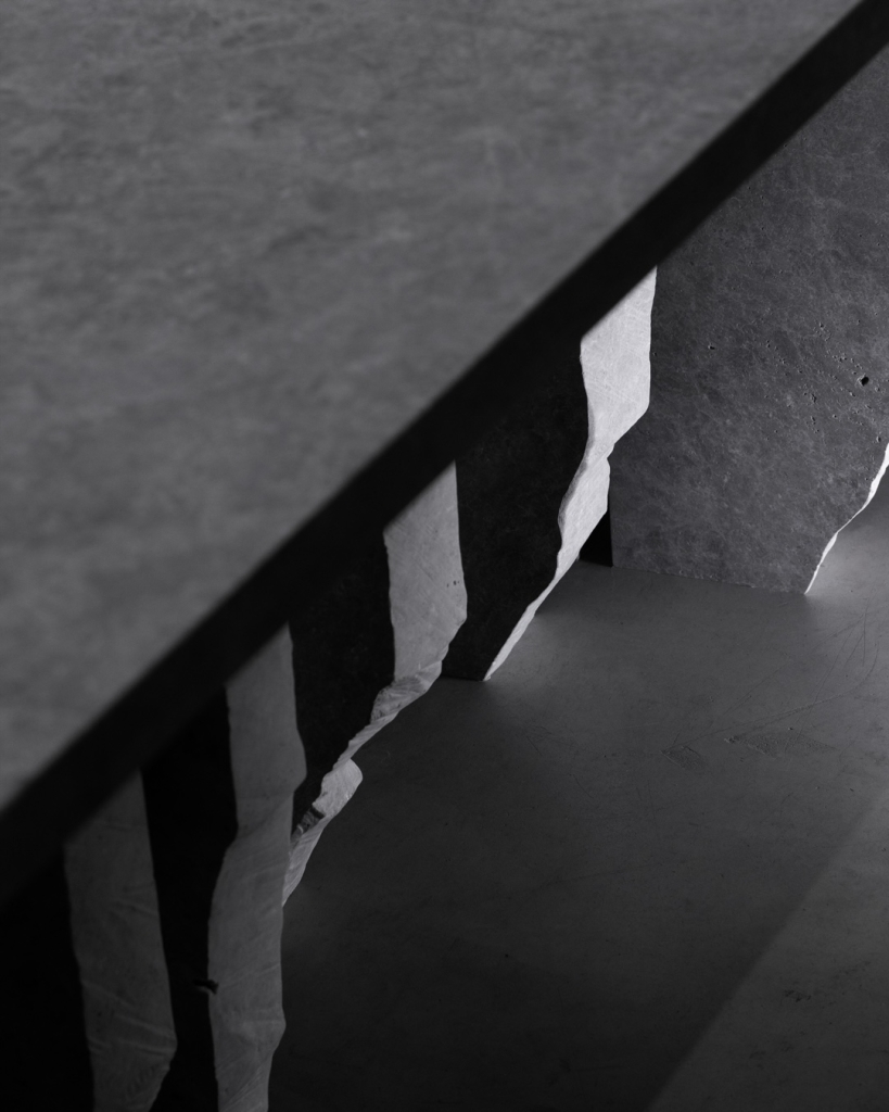 Fractured Grey Tundra marble stone table with vertical shard supports by Isac Elam Kaid