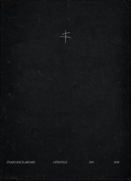 Studio Isac Elam Kaid Catalogue 003 cover featuring a black textured booklet with minimalist white insignia and typography, documenting collectible design, sculptural furniture, and site-specific commissions.
